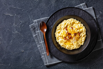 corn grits with butter, vegan cheese, and almonds
