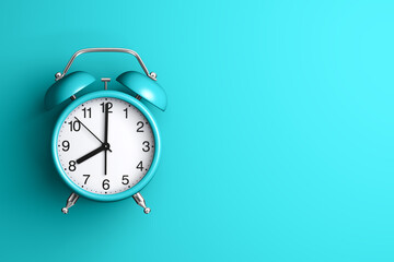 3d illustration blue alarm clock over light blue background