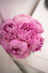 Pink wedding bouquet of peony. Sarah Bernhardt peonies. Wedding day.