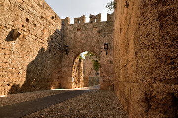 Entrance gate to the city under the fortified walls, medieval city of Rhodes GR