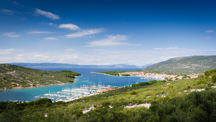 View over bay and city of Cres with Kvarner Gulf Bay on sunny day | island of Cres, Croatia