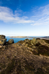 Portrait view overlooking Conwy Bay, the Great Orme & the seaside town of Llandudno from atop Conwy Mountain, North Wales