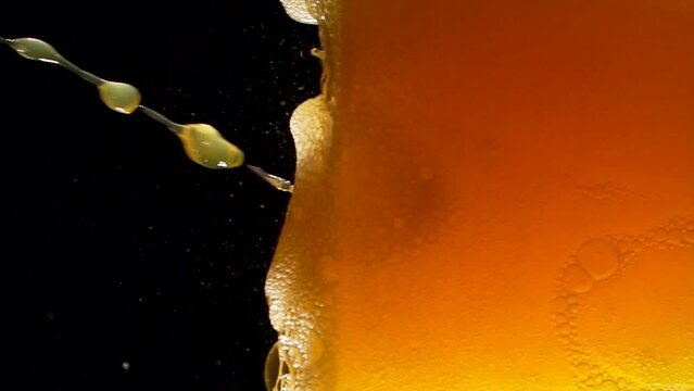 Super slow motion of clean glass with soda mineral water bubbles texture filled with fanta drink. Filmed on high speed cinema camera, 4k 1000 fps