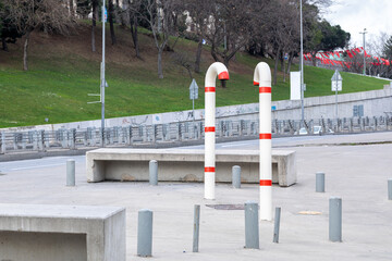 White pipes with red stripes. Pipes look like candy sticks.
