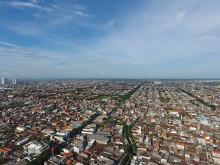 An aerial photo depicting a dense residential area in the city of Surabaya, Indonesia