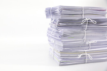 Pile or heap of financial business document paperwork stack on office desk concept of workload overtime or workplace paperless copy