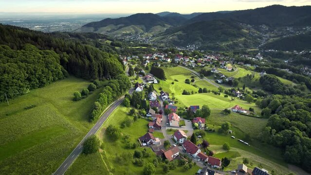 Aerial footage of an idyllic German village surrounded with beautiful nature
