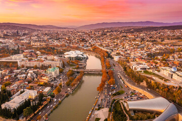 Aerial view of city centre, Kura (Mtkvari) river, and Palace of Justice in Tbilisi, Georgia.