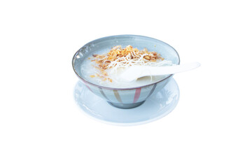 Rice gruel Isolated on cutout PNG. Traditional chinese porridge rice gruel in bowl. With egg, fried garlic, ground pork, dumpling and spoon, ready to serve. Popular to eat for breakfast.	