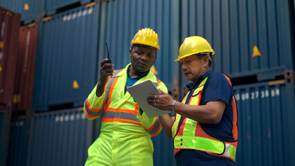 Manager survey load container for shipping plan in Logistic container area company.