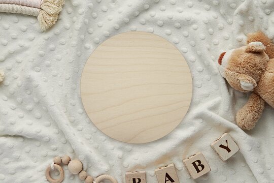 Round wooden disc mockup for baby birth announcement sign, baby name sign, wood platform.