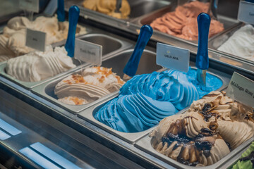 Translation: Blue Sky. Ice cream shop blue flavors 