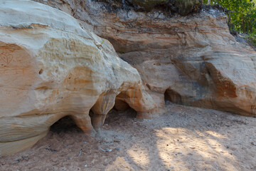 Veczemju klintis (Veczemju cliffs) on Baltic sea near Tuja, Latvia in summer season. Beautiful sea shore with limestone and sand caves
