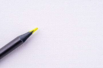 Wooden colored pencil on white water color canvas background