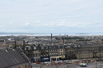 Aerial view of Edinburgh city centre with buildings and landmarks. 