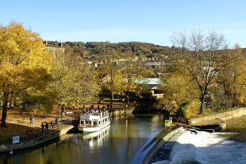 Boats in a canal in autumn, in Bath, England