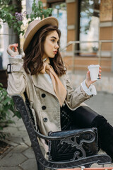 woman sitting on a bench in the city