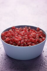 Pomegranate seeds in a bowl