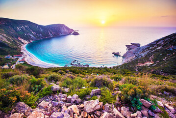 Fantastically fabulous mystical stunning magical landscape with the beach at sunset in Petani Beach, Kefalonia, Greece. Amazing places. Tourist Attractions. - obrazy, fototapety, plakaty