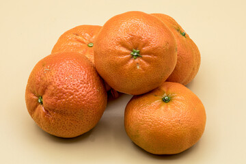 pictures of tangerine fruit on orange background