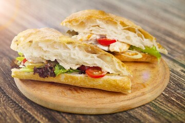 Tasty fresh sandwich with cheese and vegetables