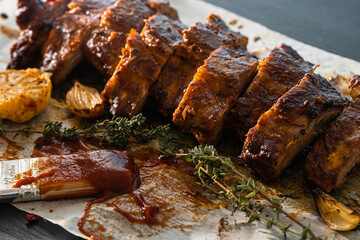 juicy hot grilled ribs from a summer barbecue in nature.
