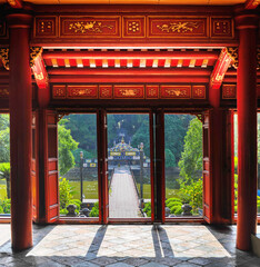 classical vietnamesered wooden interior of a entrance portal chainise style