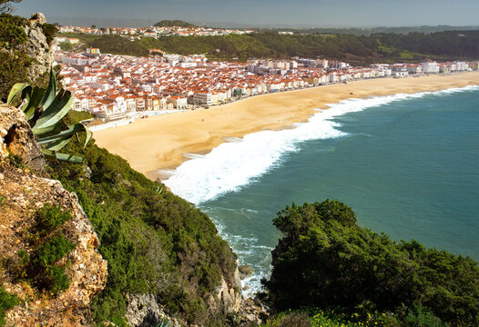high point view of Nazare. Sand beach, sea, village Nazare, Portugal.