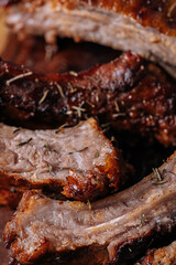 Smoked BBQ Ribs from a summer barbecue in nature.