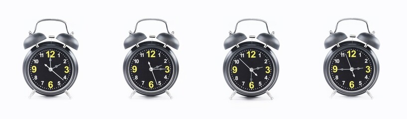 close up of a set of black alarm clocks showing the time; 2, 2.15, 2.30 and 2.45 p.m or a.m Isolated on white background - obrazy, fototapety, plakaty