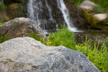 Naklejka na ściany i meble waterfall in the forest. waterfall, waterfall in the park, water.