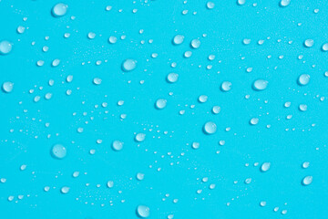 Pattern made of lots of little water dew drops shining and glowing on bright sunlight as mock up with copy space, macro