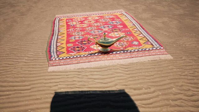 A magic carpet flying over the desert with a gold magic genie lamp sitting on the front.