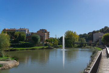 Fototapeta na wymiar Fountain in the Llobregat river as it passes through the town of Gironella