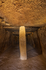 Interior of the Menga dolmen, view of the central pillar, UNESCO site, Antequera, Spain