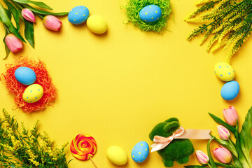 Easter frame. Holiday symbol on yellow background. copy space