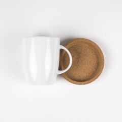 Coffee cup and coaster on the table