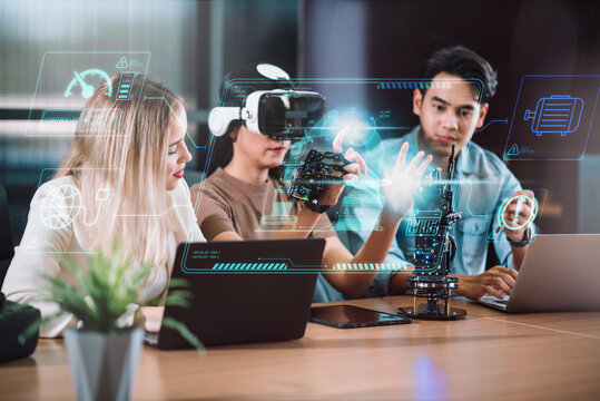 Female and male robotic engineer learning with specialish, student discuss and working with blueprint and coding program for robot arm. Technology and innovation concept.