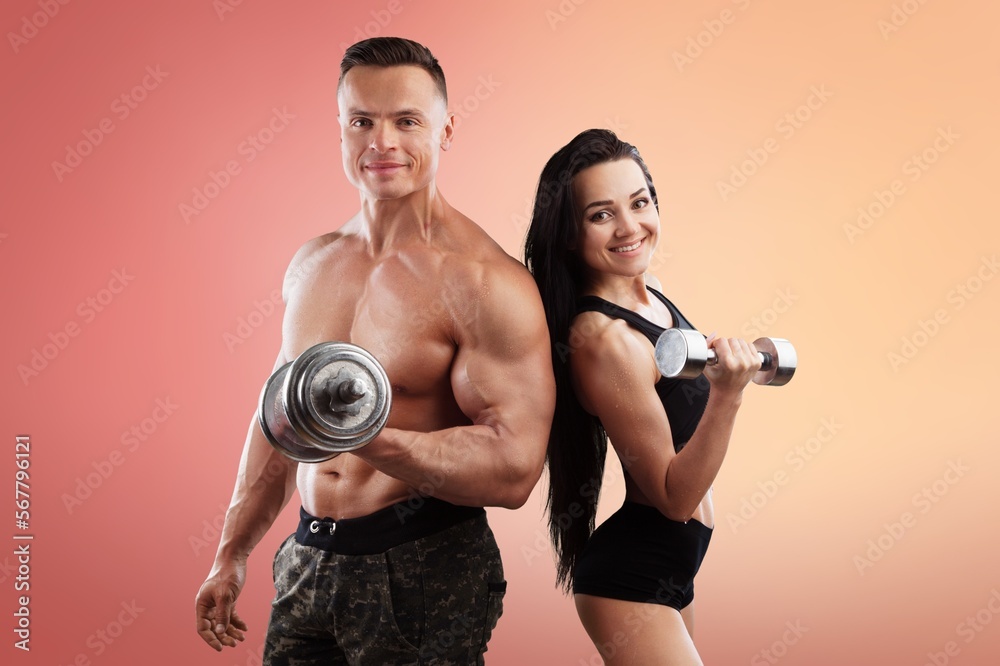 Sticker fitness sporty couple models hold equipment