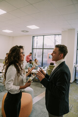Two business colleagues talking