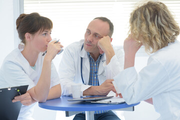 medical staff chatting in modern hospital canteen