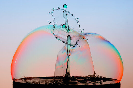 Close-up of a water droplet and splash crown