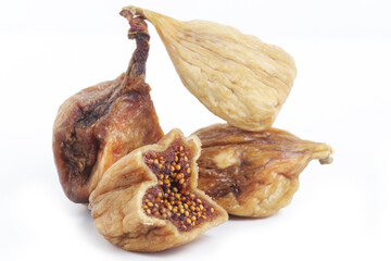 Naturally sweet dried figs in thw white background. Healthy Mediterranean figs