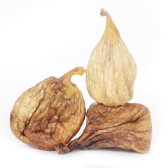 Naturally sweet dried figs in thw white background. Healthy Mediterranean figs