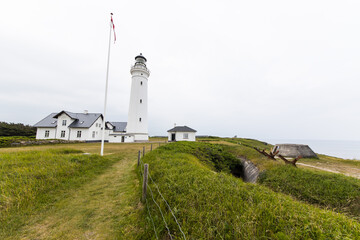 Fototapeta na wymiar The historical lighthouse a the coast of Skagerrak in Hirtshals, Denmark