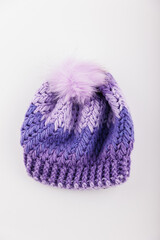 Fototapeta na wymiar purple ice cap and gloves in white background