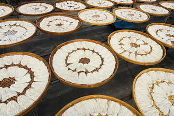 Close-up of traditional handmade noodle-making drying outdoors in Guanmiao, Tainan, Taiwan.