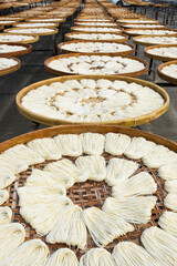 Close-up of traditional handmade noodle-making drying outdoors in Guanmiao, Tainan, Taiwan.