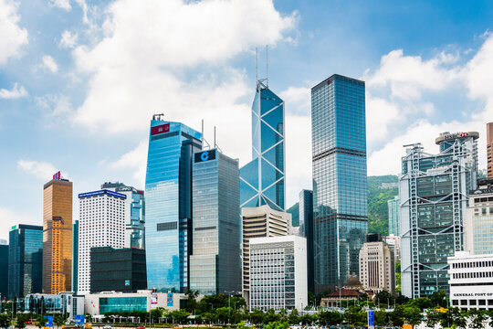 Central, Hong Kong - July 16, 2019: Modern business buildings with blue sky in Central, hong kong.