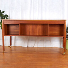 Writing desk 1960s in teak wood with drawers. Modern Scandinavian furniture. Interior photograph,...